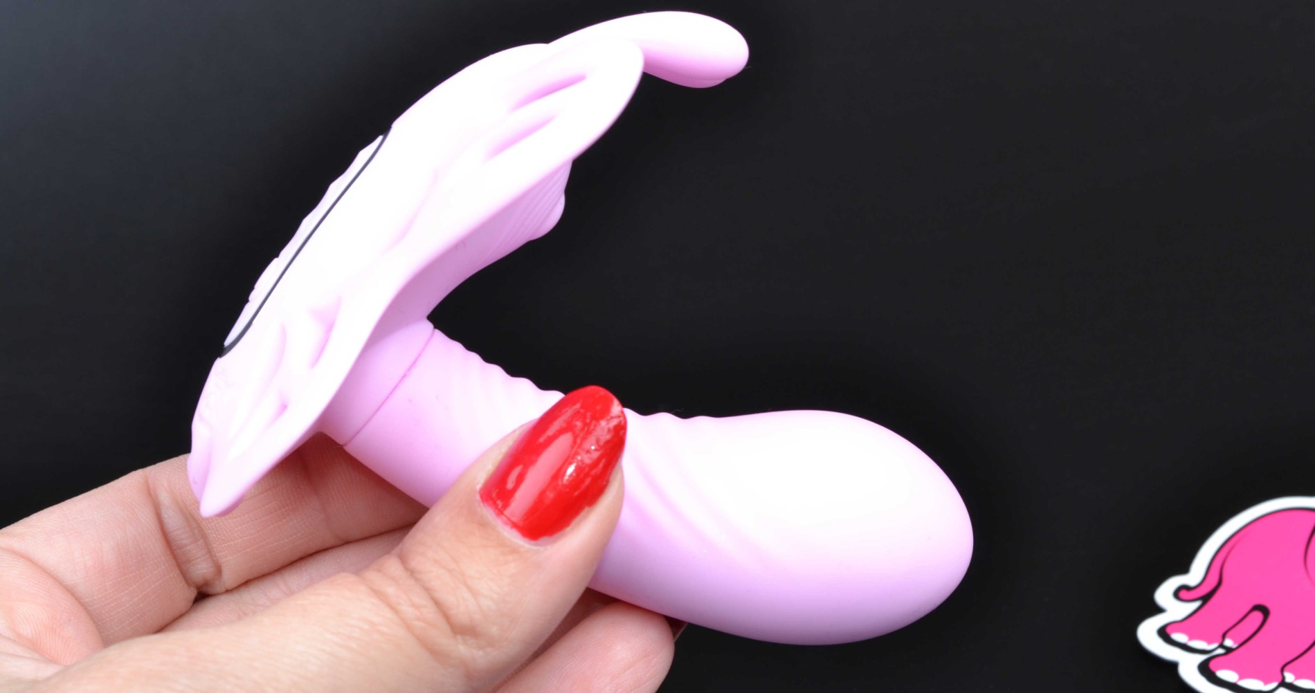 Vibrační motýlek Darling, v ruce