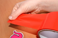 Bondážní páska Rouge – odbalování pásky